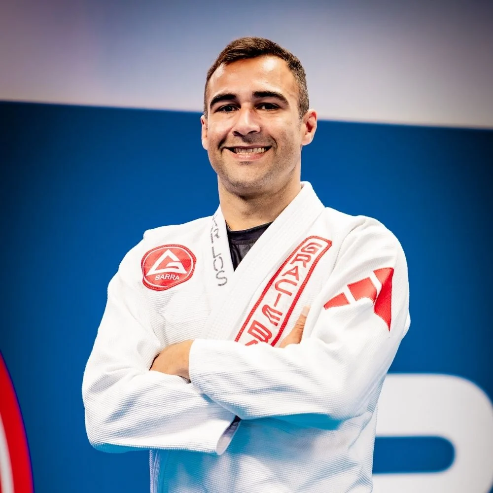 Professor Carlos Schiezaro, Second-Degree Black Belt and Jiu‑Jitsu instructor at Gracie Barra Artarmon